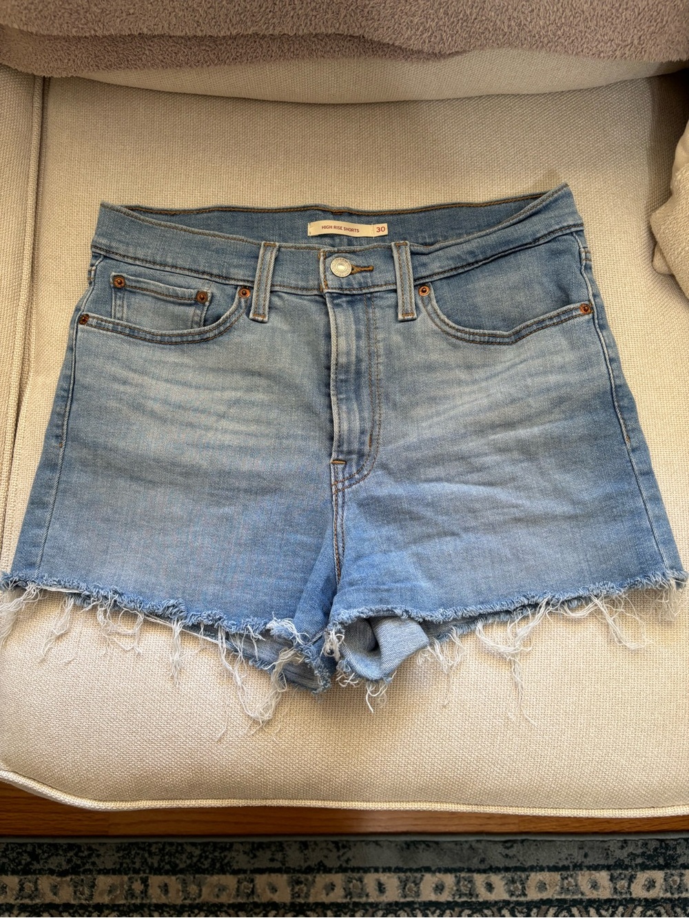 Levi's Light Blue Frayed Denim Cutoff Shorts